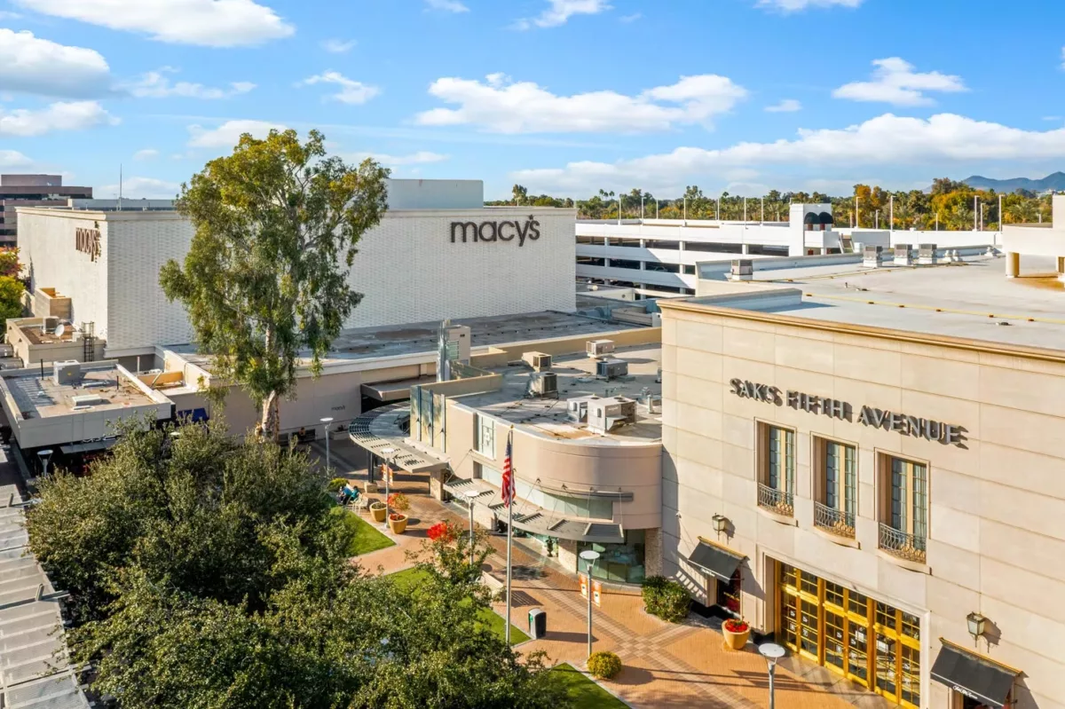 Aerial view of Saks Fifth Avenue and Macy's at upscale outdoor shopping center.