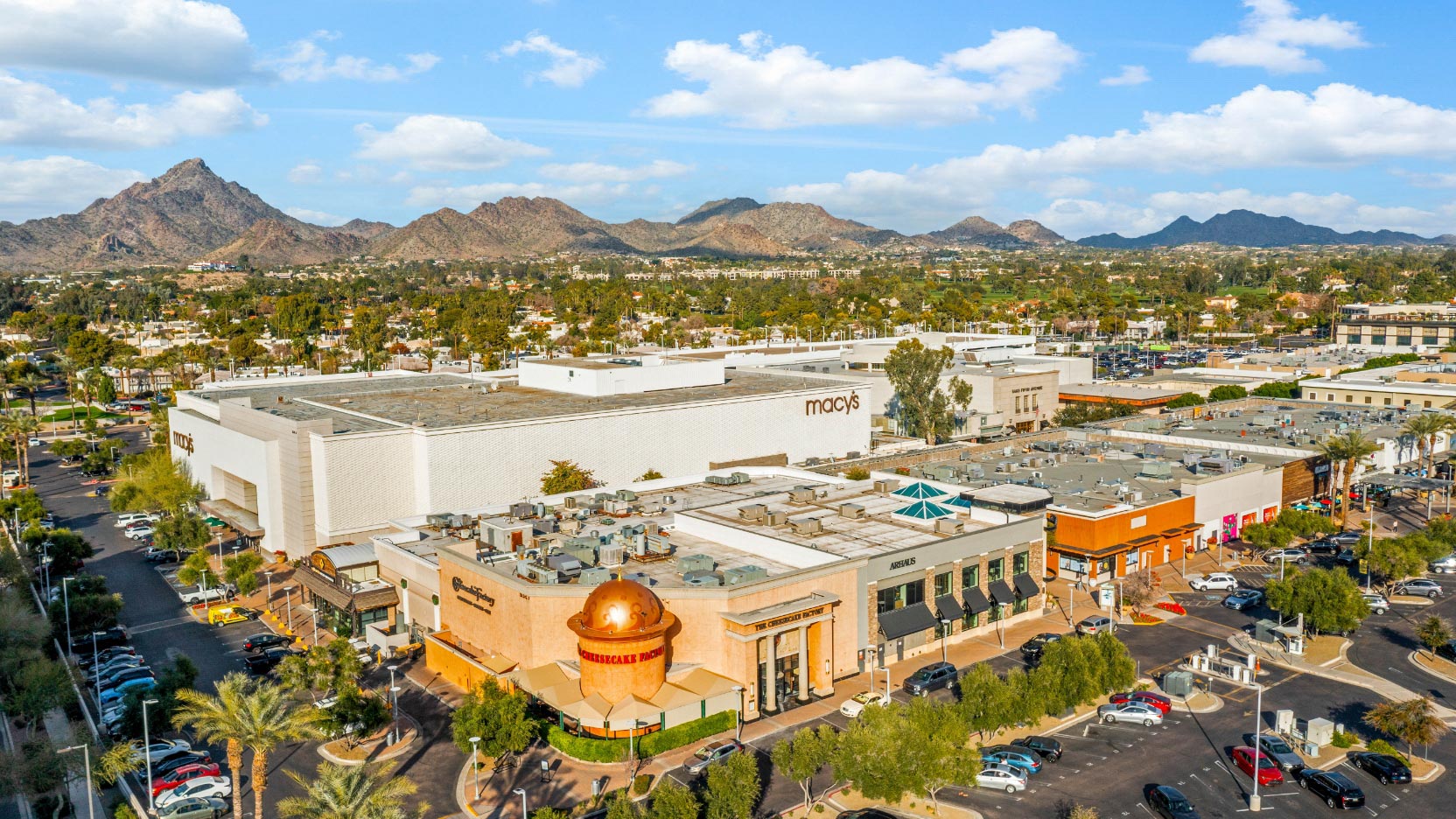 Aerial of mall with mountain view